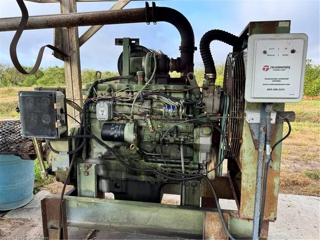 a bathroom with a granite countertop window and a shower
