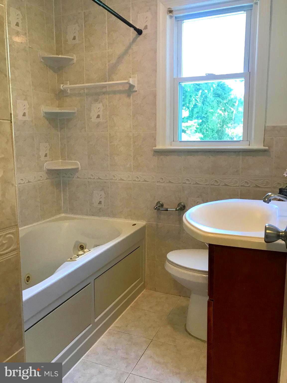 11939 Bluhill Road Silver Spring, MD 20902 - Photo 14 of 17 Upstairs bathroom with jacuzzi tub