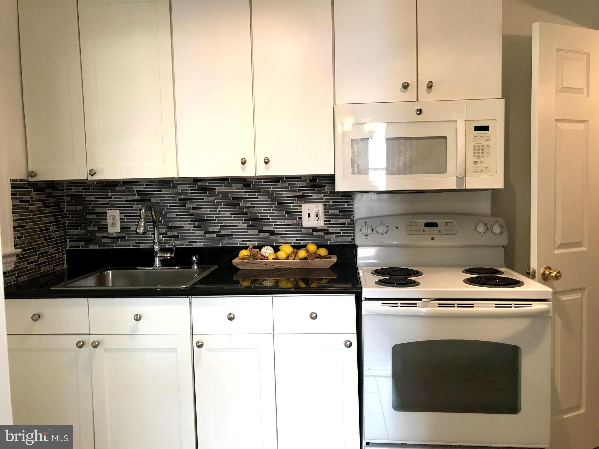 11939 Bluhill Road Silver Spring, MD 20902 - Photo 6 of 17 Updated kitchen with granite counters