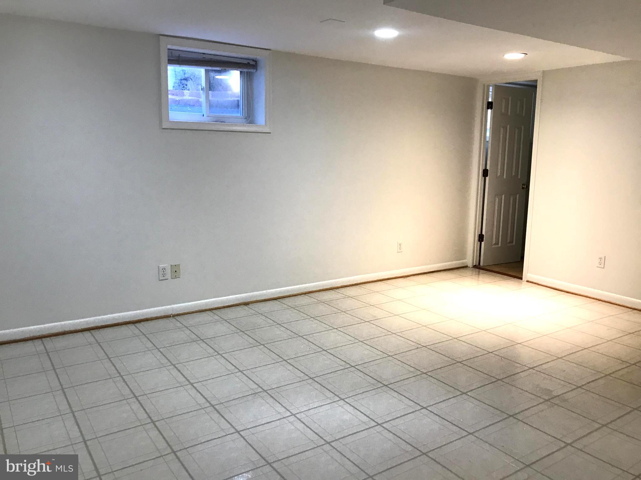 11939 Bluhill Road Silver Spring, MD 20902 - Photo 10 of 17 Basement view 1