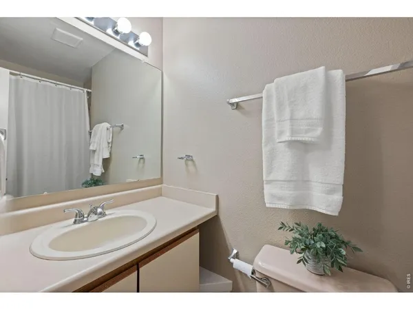 a view of workspace with furniture and window