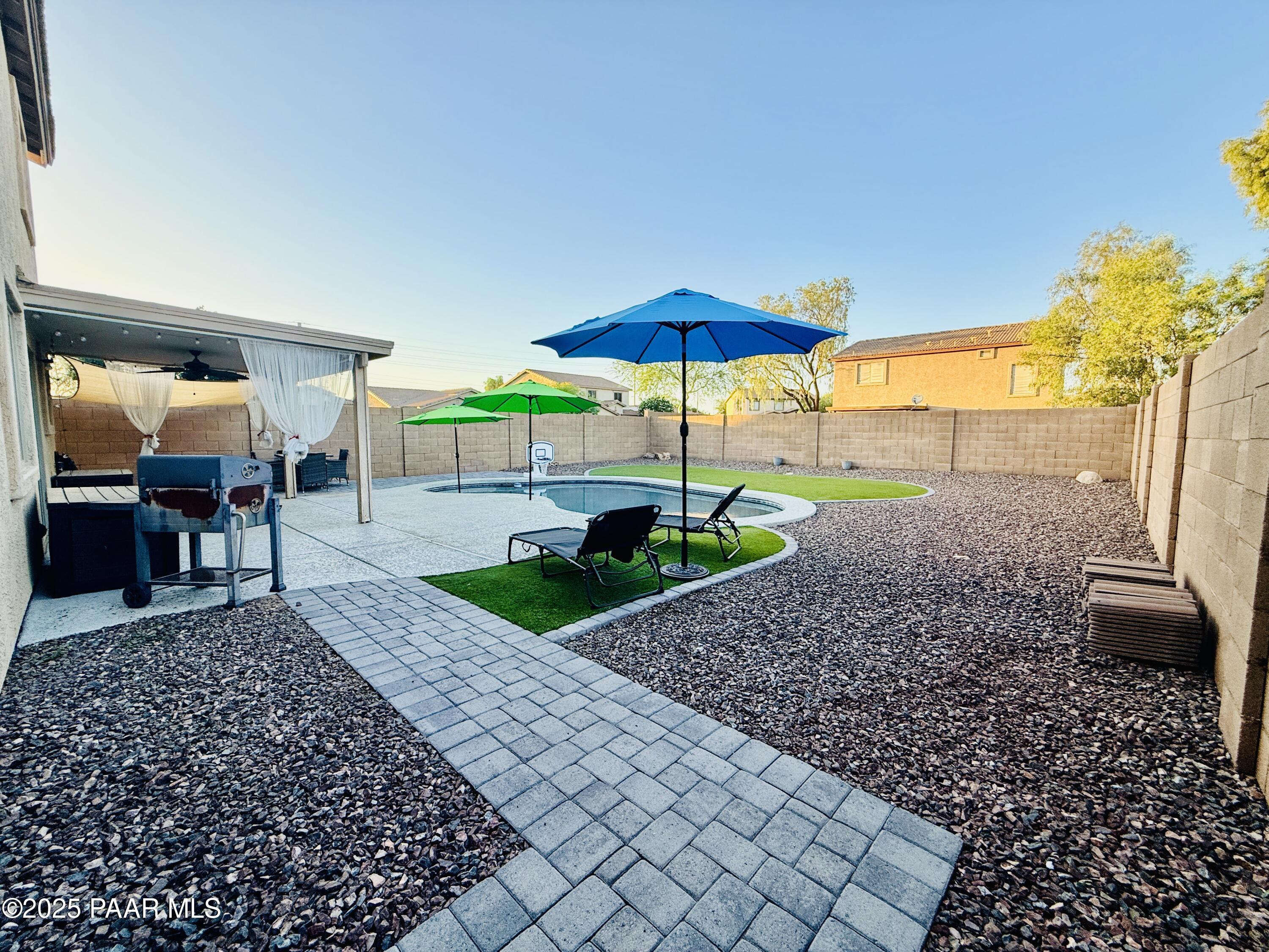 16246 West Boca Raton Road Surprise, AZ 85379 - Photo 27 of 28 Relaxing Backyard