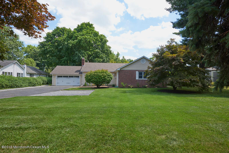 82 Kings Road Little Silver, NJ 07739 - Photo 2 of 19 a view of a house with backyard