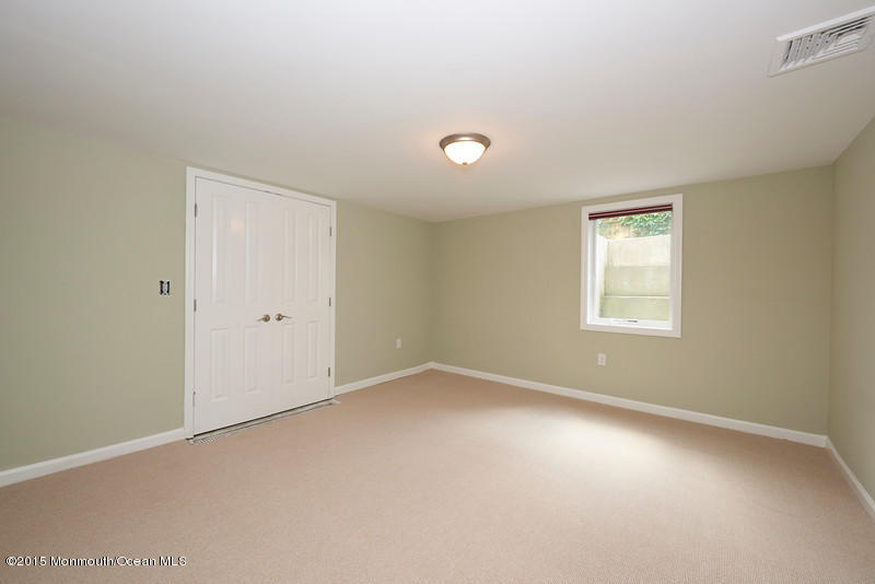 82 Kings Road Little Silver, NJ 07739 - Photo 12 of 19 an empty room with a window
