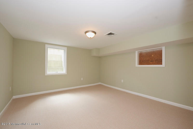 82 Kings Road Little Silver, NJ 07739 - Photo 13 of 19 an empty room with a window