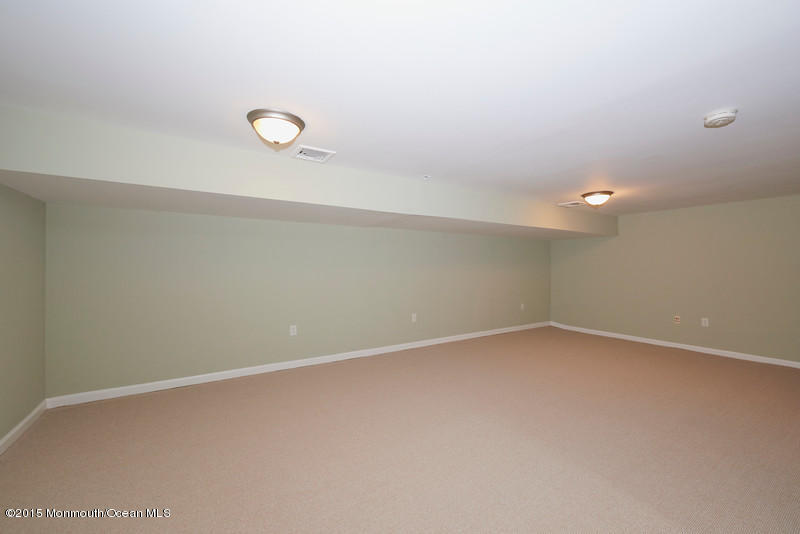 82 Kings Road Little Silver, NJ 07739 - Photo 16 of 19 a view of an empty room with a window
