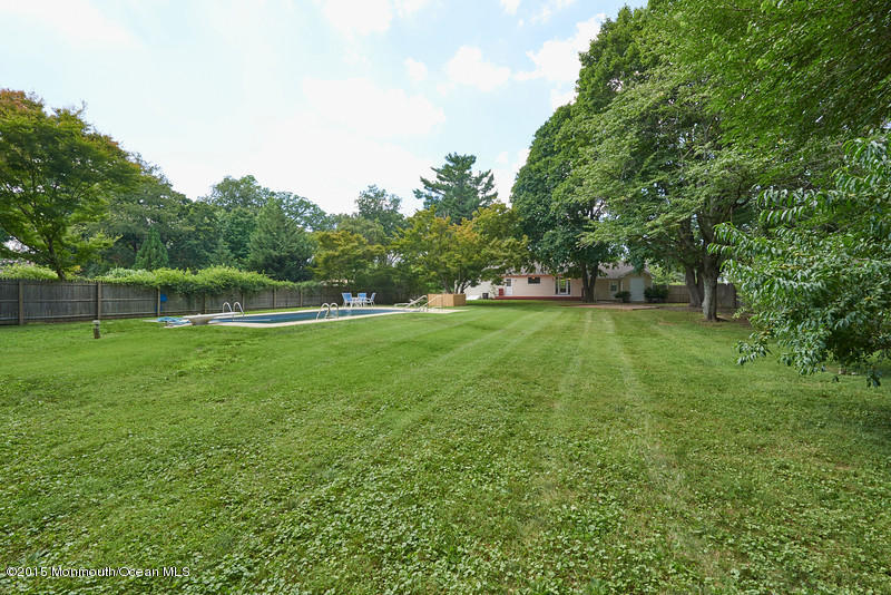 82 Kings Road Little Silver, NJ 07739 - Photo 18 of 19 a view of outdoor space with deck and yard