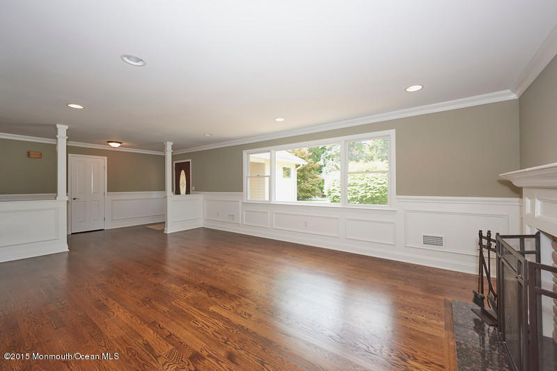 82 Kings Road Little Silver, NJ 07739 - Photo 5 of 19 a view of an empty room with wooden floor and a window