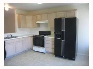 a view of a living room with a flat screen tv