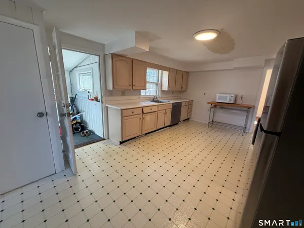 a view of an empty room and window