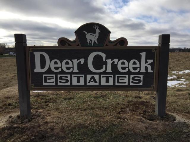 10370 East Deer Creek Lane Rochelle, IL 61068 - Photo 3 of 3 a close up of a street sign