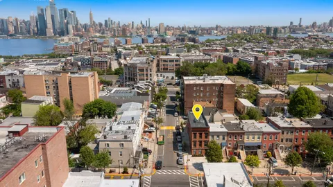 a view of a city with tall buildings