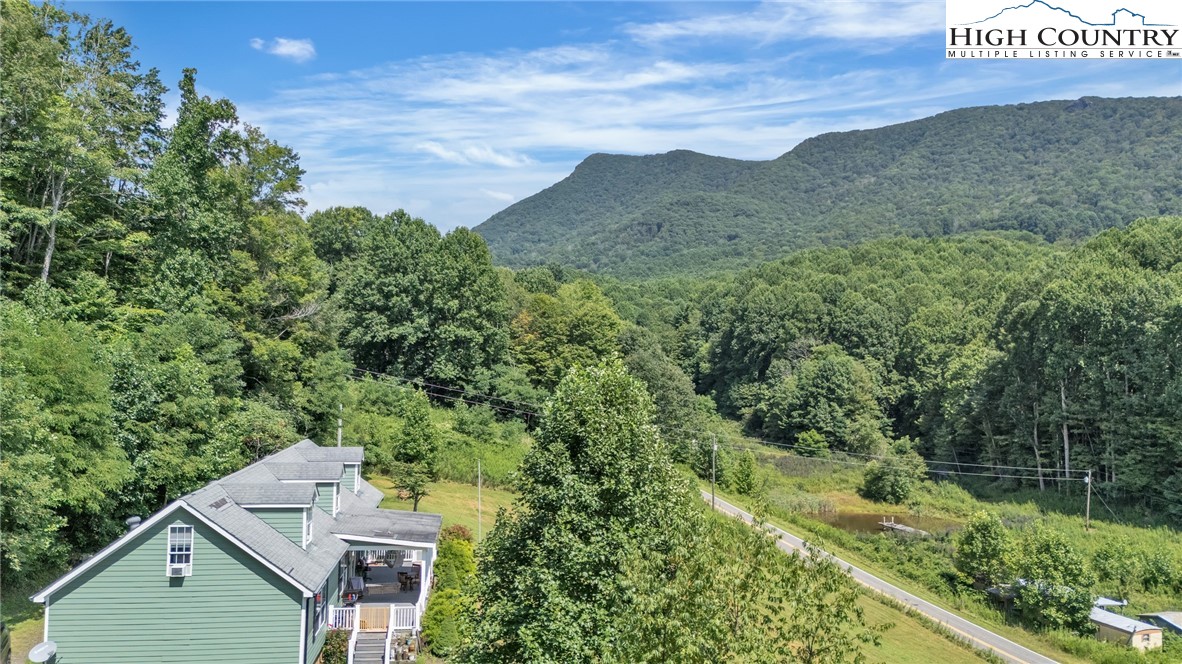 3786 Peak Road Creston, NC 28615 - Photo 13 of 31 an aerial view of a house with a yard