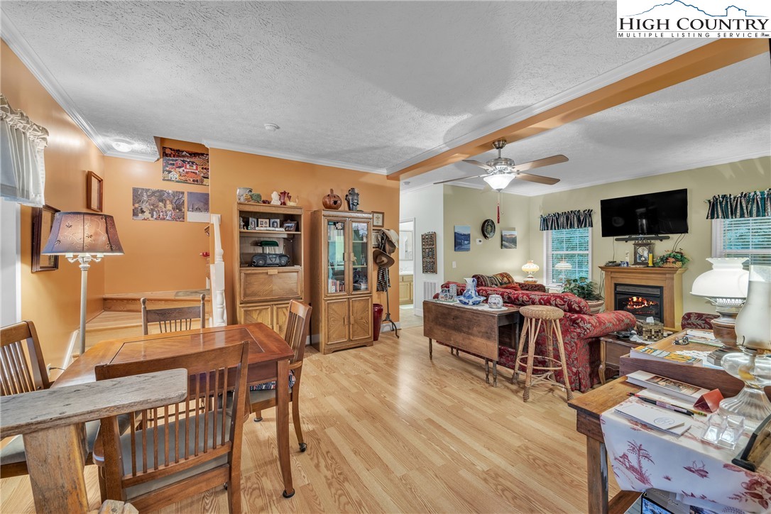 3786 Peak Road Creston, NC 28615 - Photo 24 of 31 a living room with furniture and a flat screen tv