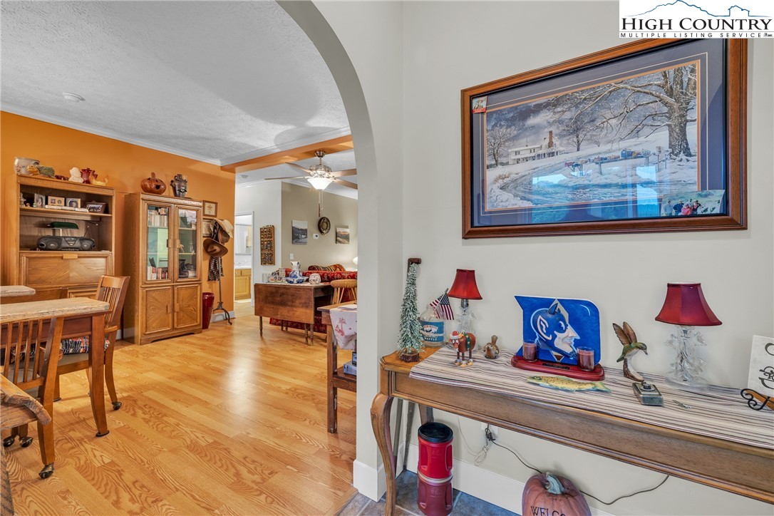 3786 Peak Road Creston, NC 28615 - Photo 30 of 44 a living room with furniture and wooden floor