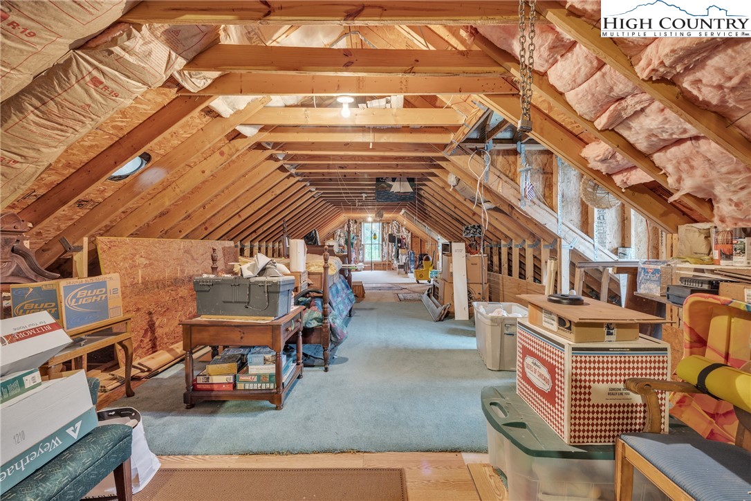 3786 Peak Road Creston, NC 28615 - Photo 33 of 44 a view of a chairs and a room in a patio