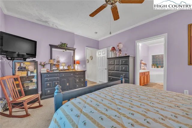 a bedroom with a bed and furniture