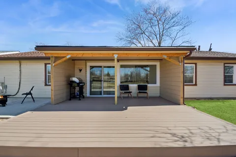 a backyard of a house with seating space