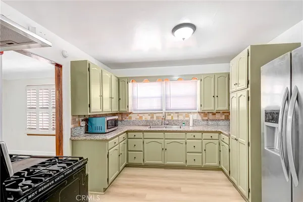 $809,900 | 7422 Brighton Avenue, Los Angeles, CA 90047