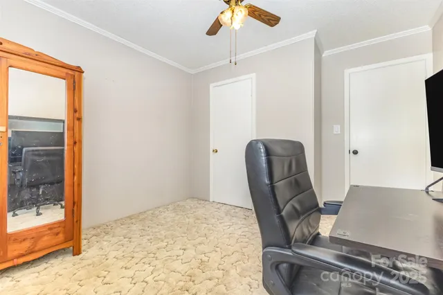 a workspace with furniture and a window