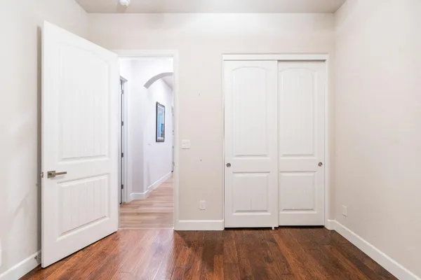 a bathroom with a glass shower door