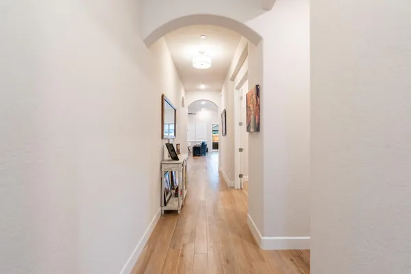 a living room with a flat screen tv and a fireplace