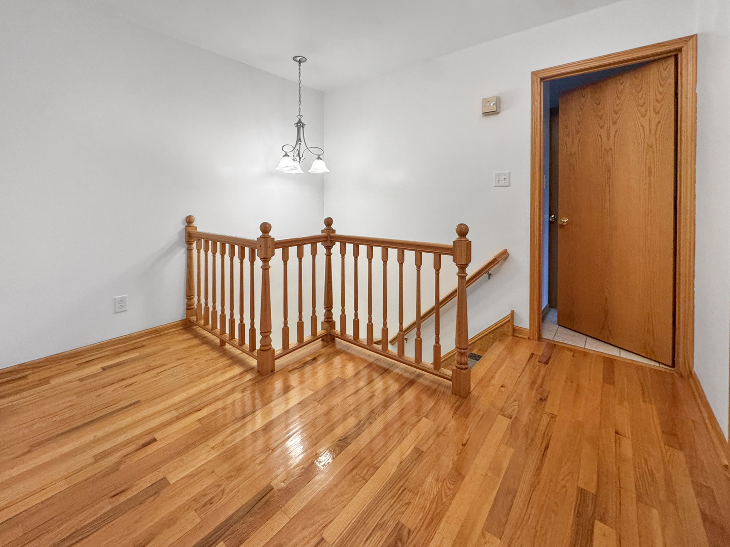 1105 Summit Drive Lockport, IL 60441 - Photo 10 of 15 a view of a room with wooden floor