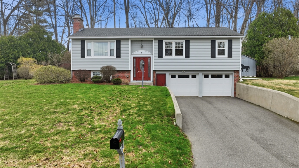 5 Westview Terrace Easthampton, MA 01027 - Photo 1 of 39 a front view of a house with a yard