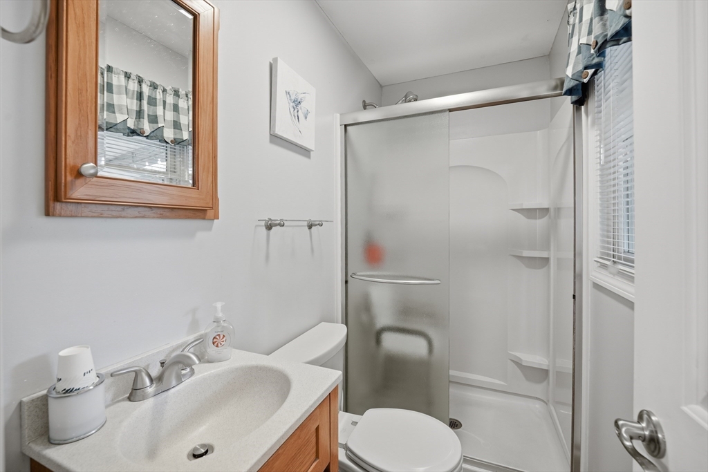 5 Westview Terrace Easthampton, MA 01027 - Photo 25 of 39 a bathroom with a sink toilet and shower