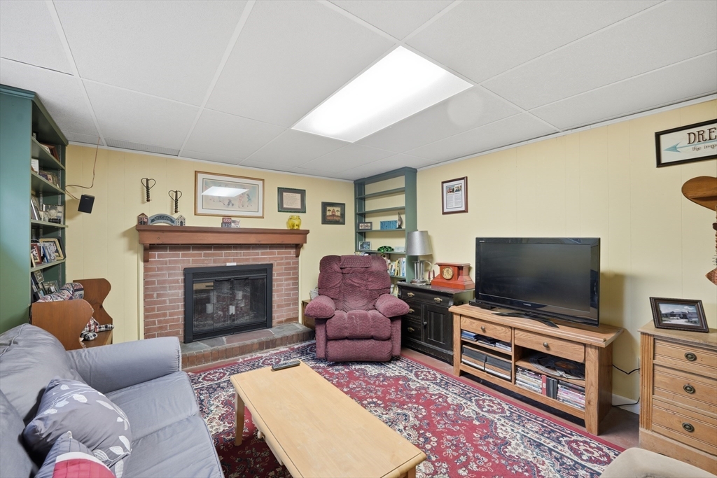 5 Westview Terrace Easthampton, MA 01027 - Photo 30 of 39 a living room with furniture and a flat screen tv
