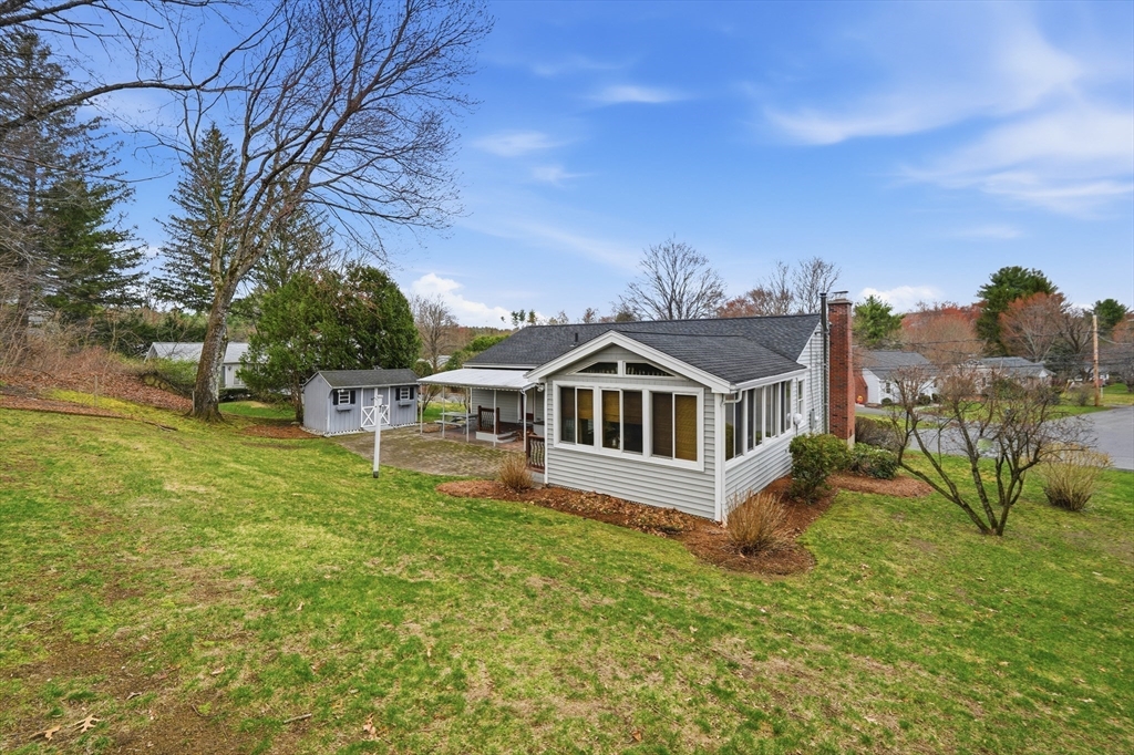 5 Westview Terrace Easthampton, MA 01027 - Photo 3 of 39 a front view of a house with a garden