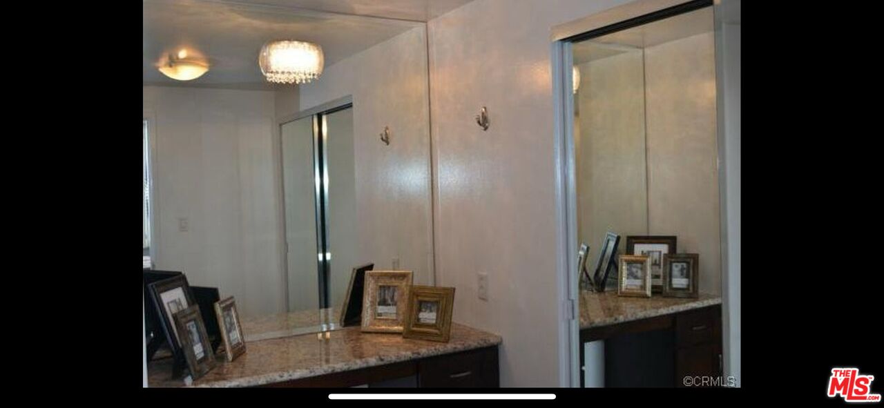 2170 Century Park East, Unit 1611 Los Angeles, CA 90067 - Photo 17 of 41 a view of kitchen with cabinets and wooden floor