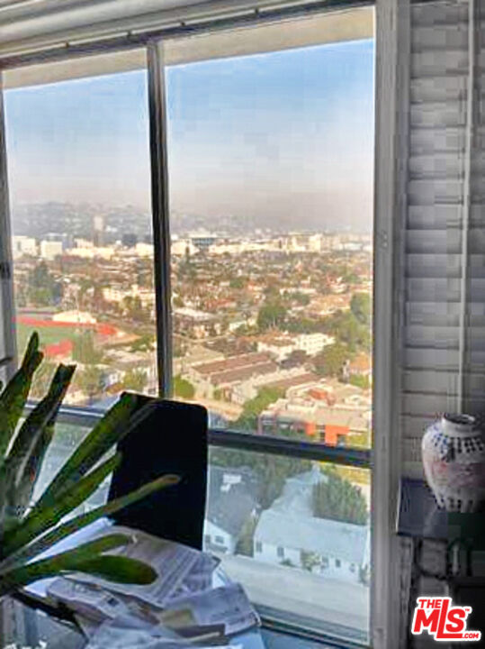 2170 Century Park East, Unit 1611 Los Angeles, CA 90067 - Photo 3 of 41 a view of a floor to ceiling window and an outdoor space