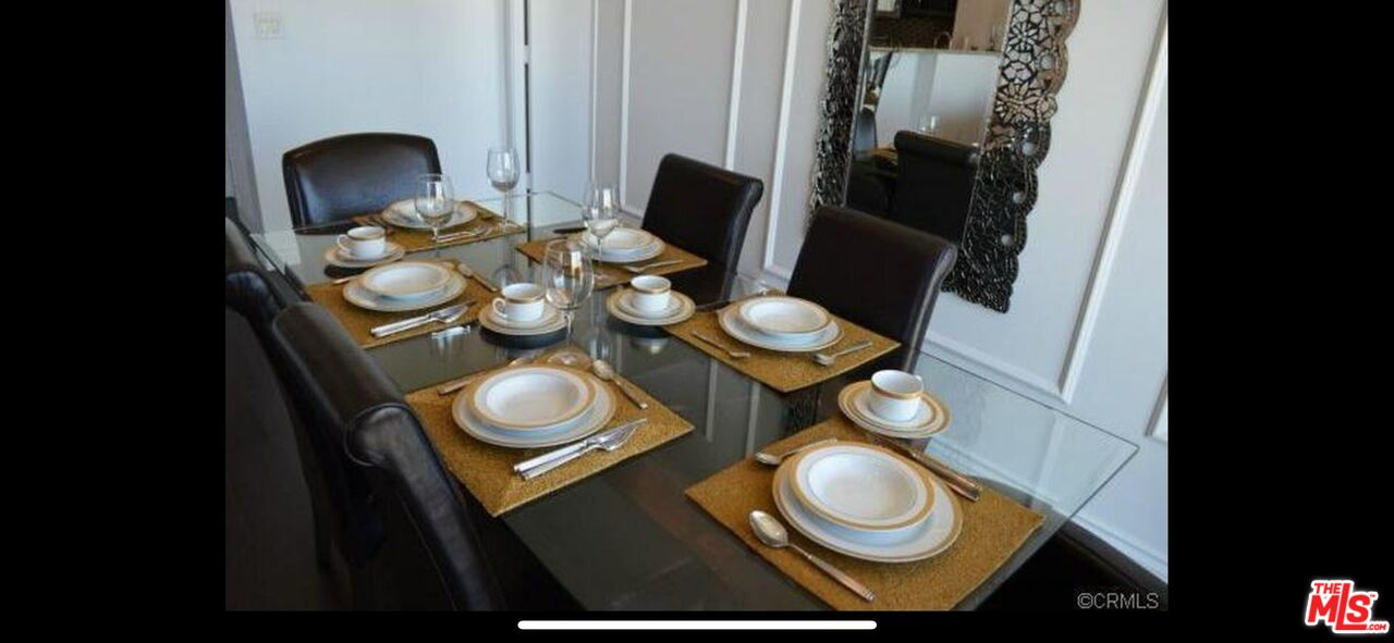 2170 Century Park East, Unit 1611 Los Angeles, CA 90067 - Photo 9 of 41 a bathroom with a toilet sink and mirror