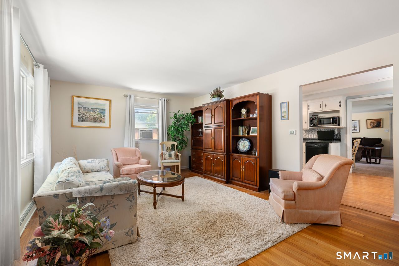 9 Stanton Road North Haven, CT 06473 - Photo 3 of 35 a living room with furniture and wooden floor
