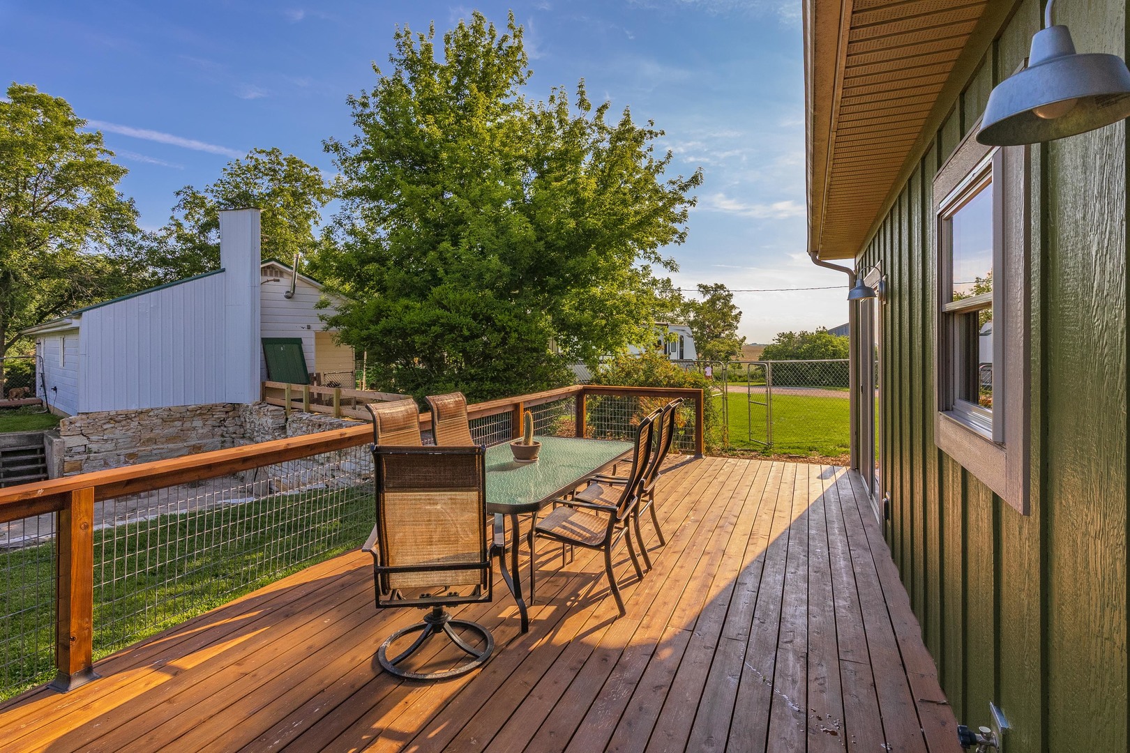 22037 East 2600 N Road Odell, IL 60460 - Photo 38 of 59 a view of a balcony with two chairs and wooden floor