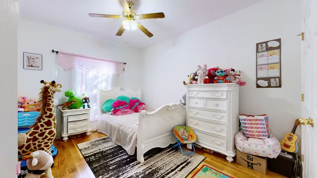 a bedroom with furniture and a couch