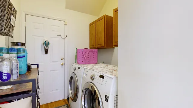 a utility room with dryer and washer