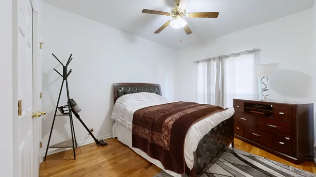 a bedroom with a bed and a closet