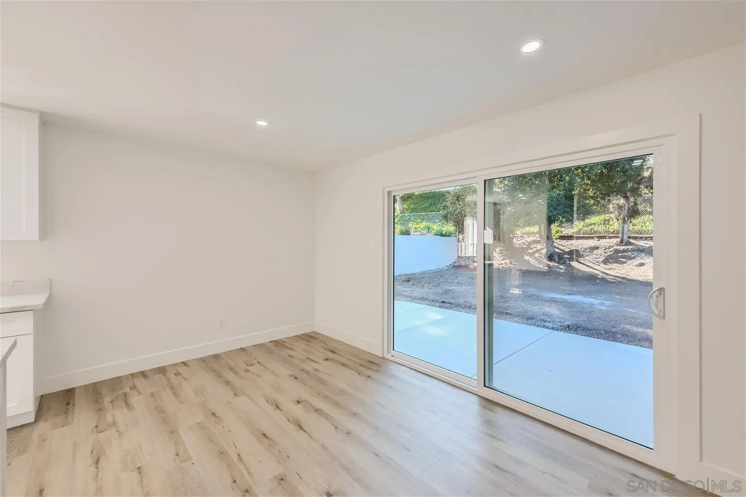 14222 Halper Road Poway, CA 92064 - Photo 11 of 30 wooden floor in an empty room with a window