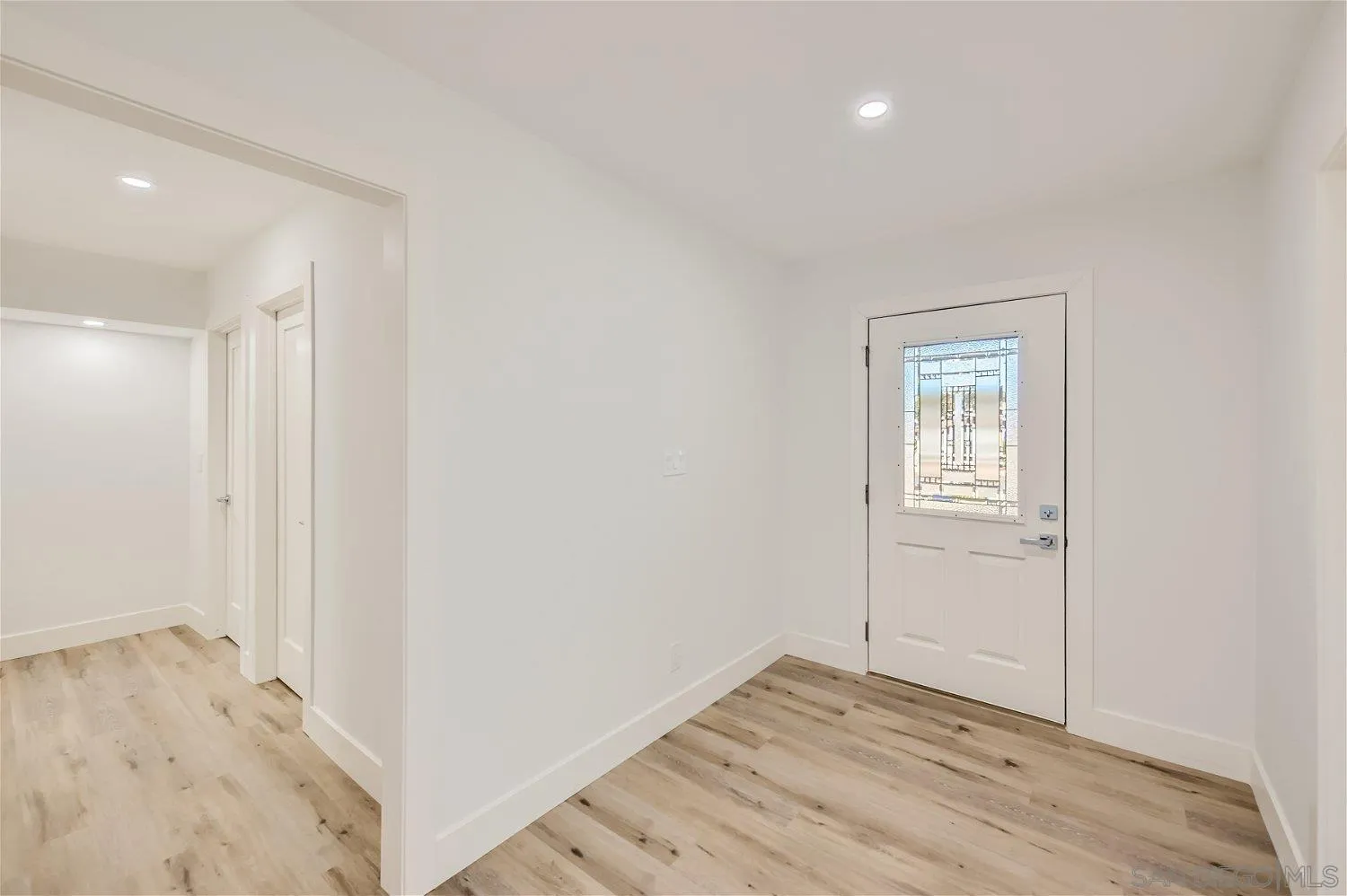 14222 Halper Road Poway, CA 92064 - Photo 12 of 30 a view of empty room with wooden floor