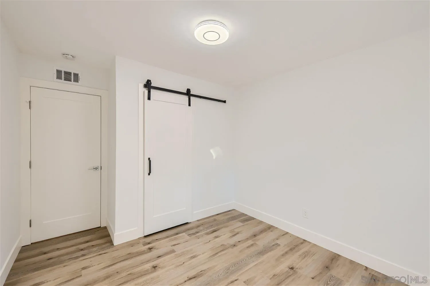 14222 Halper Road Poway, CA 92064 - Photo 18 of 30 a view of a room with wooden floor