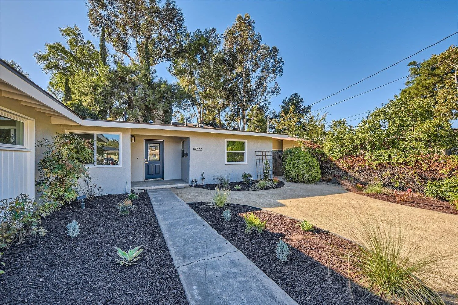 14222 Halper Road Poway, CA 92064 - Photo 24 of 30 front view of a house with a yard