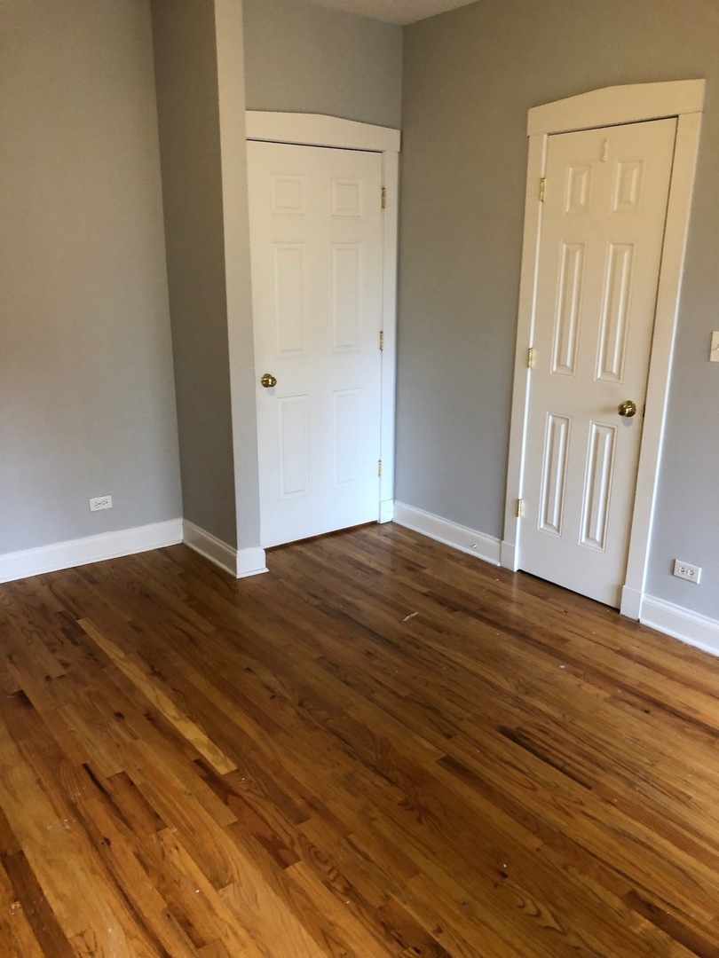 4855 North Drake Avenue, Unit 1 Chicago, IL 60625 - Photo 20 of 20 a view of a room with wooden floor