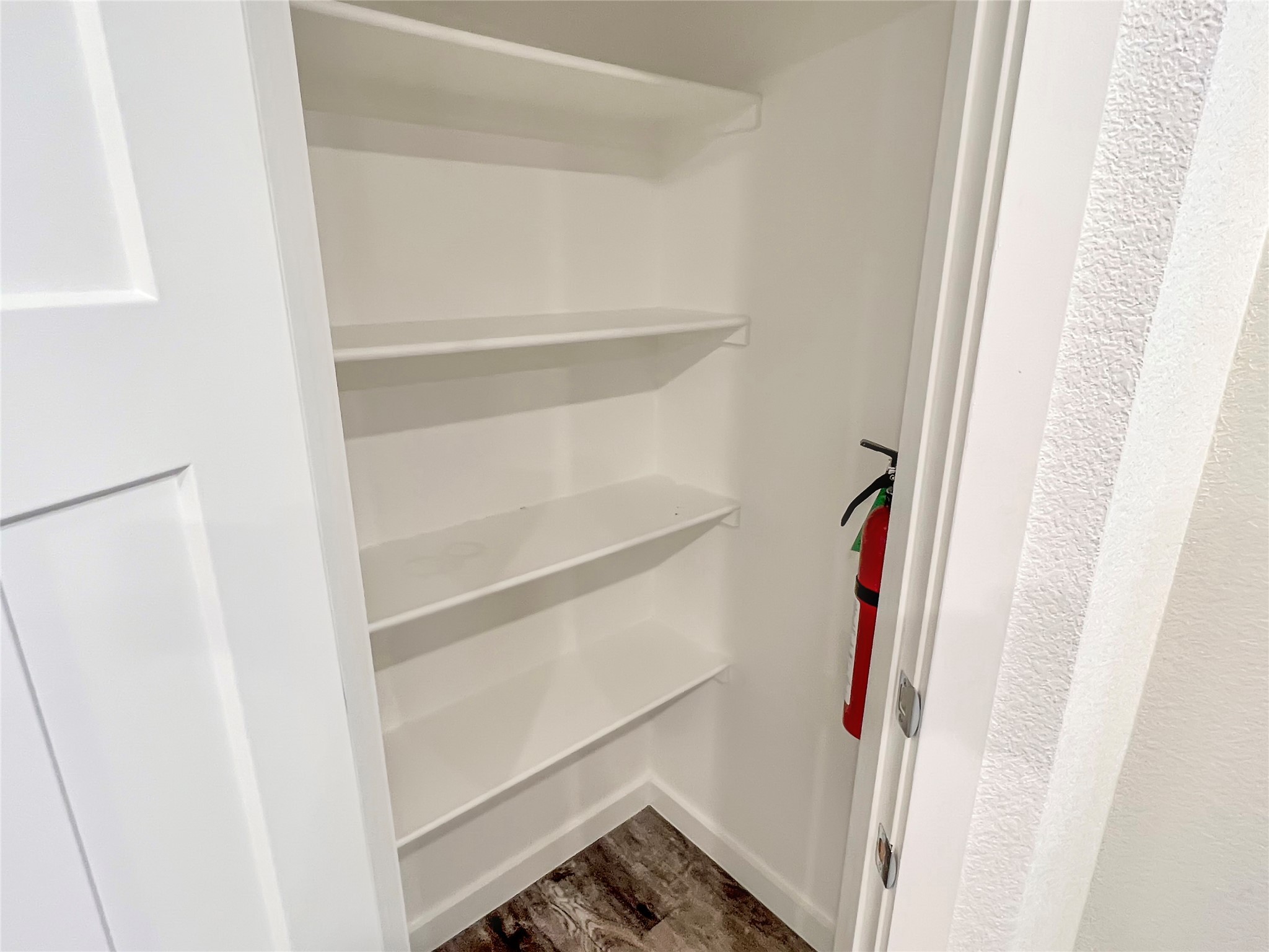 21155 Gosling Road, Unit 48 AD Spring, TX 77388 - Photo 12 of 20 a view of walk in closet with clothes