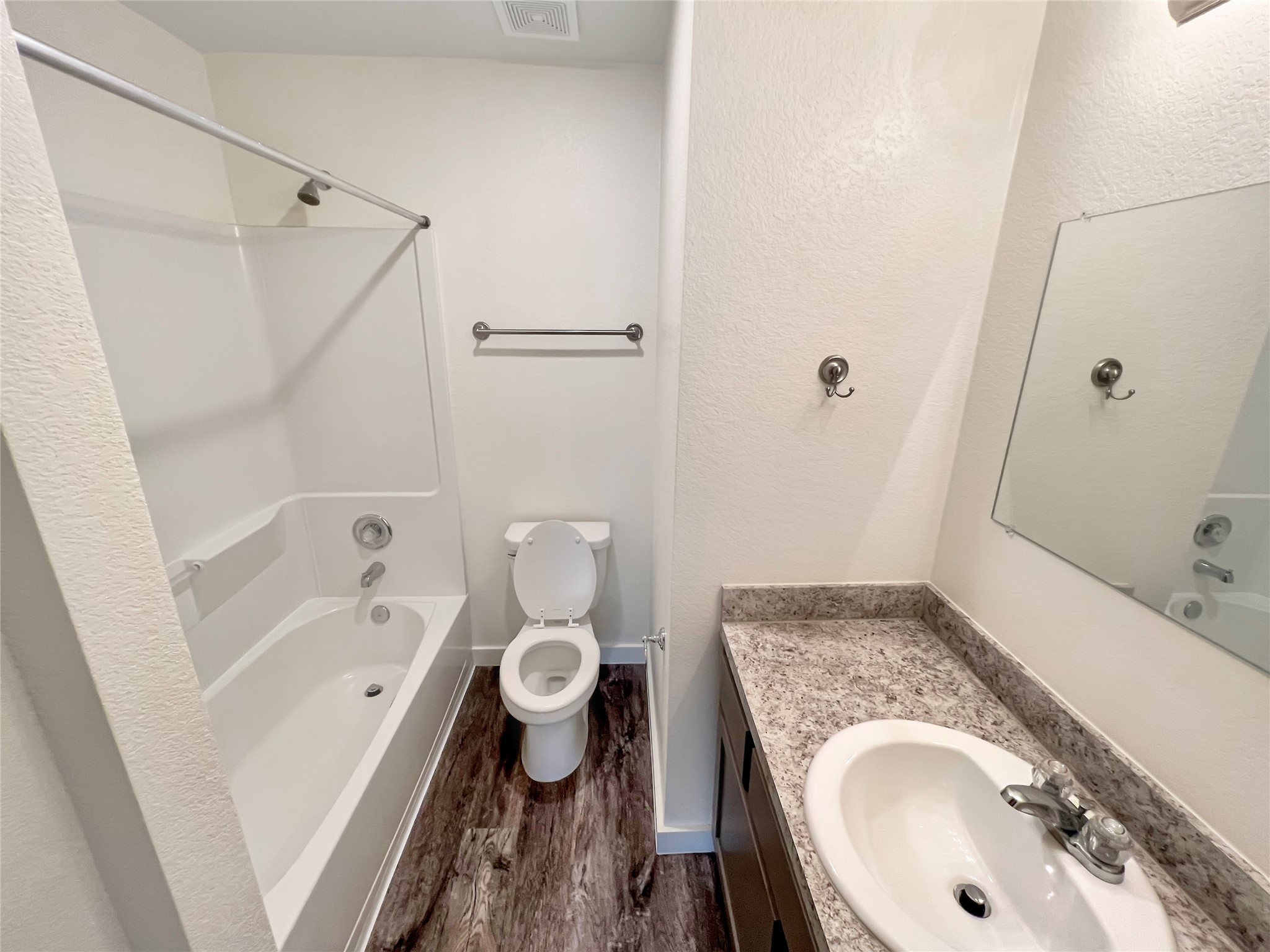 21155 Gosling Road, Unit 48 AD Spring, TX 77388 - Photo 16 of 20 a bathroom with a sink a toilet and shower