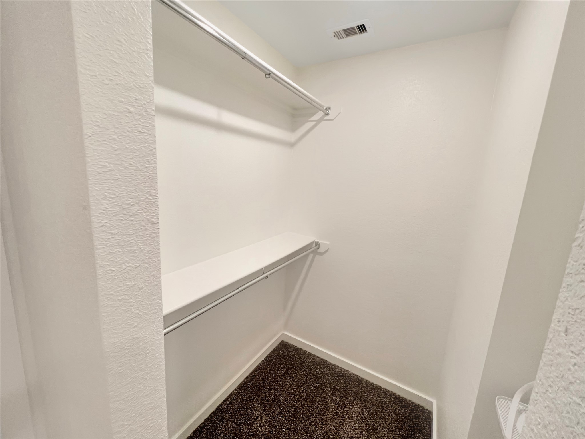 21155 Gosling Road, Unit 48 AD Spring, TX 77388 - Photo 17 of 20 a view of walk in closet