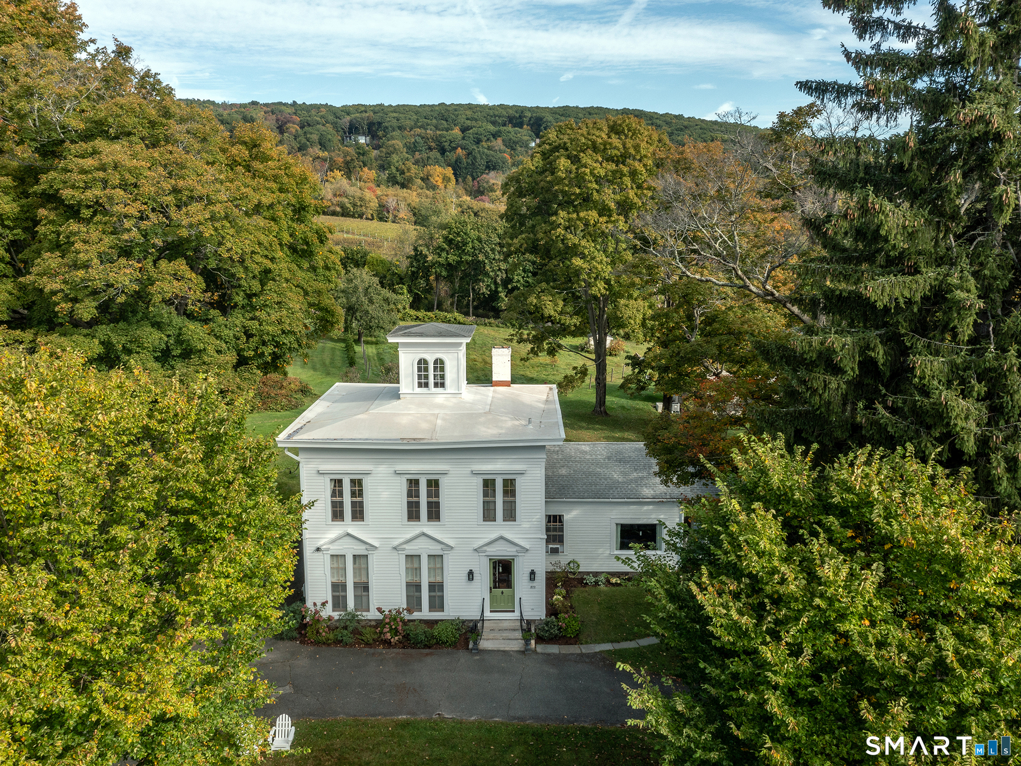 15 Hopkins Road Warren, CT 06777 - Photo 6 of 8 an aerial view of a house with a yard