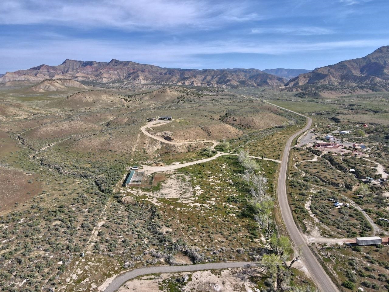 2423 16 Road Loma, CO 81524 - Photo 36 of 38 a view of a city with mountains in the background