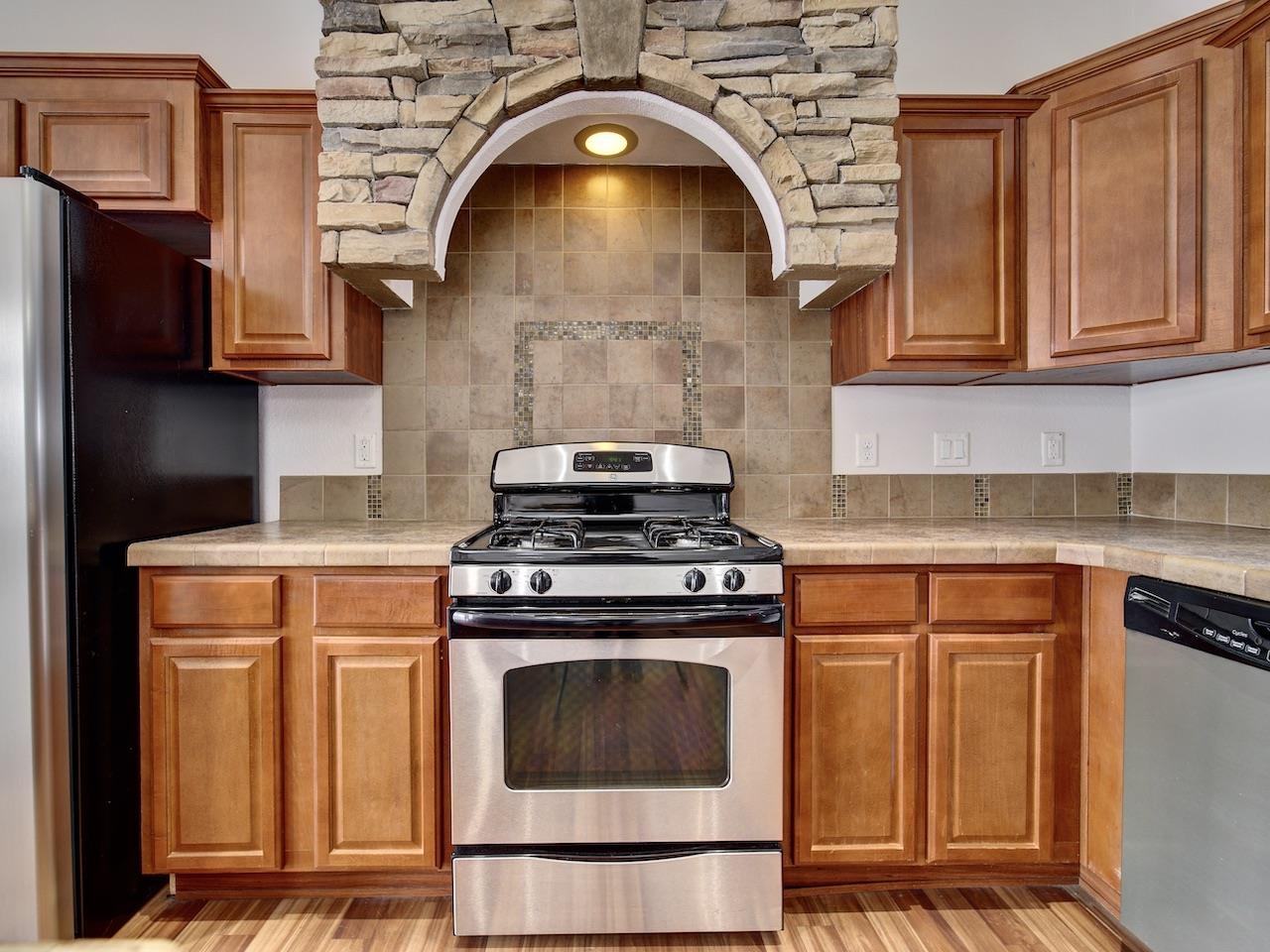 2423 16 Road Loma, CO 81524 - Photo 8 of 38 a stove top oven sitting inside of a kitchen